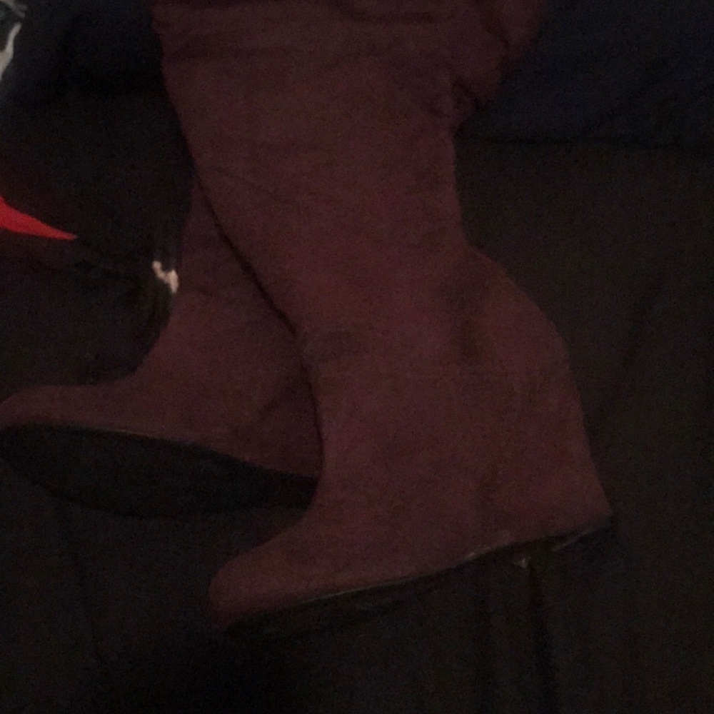Knee high purple wedge boots